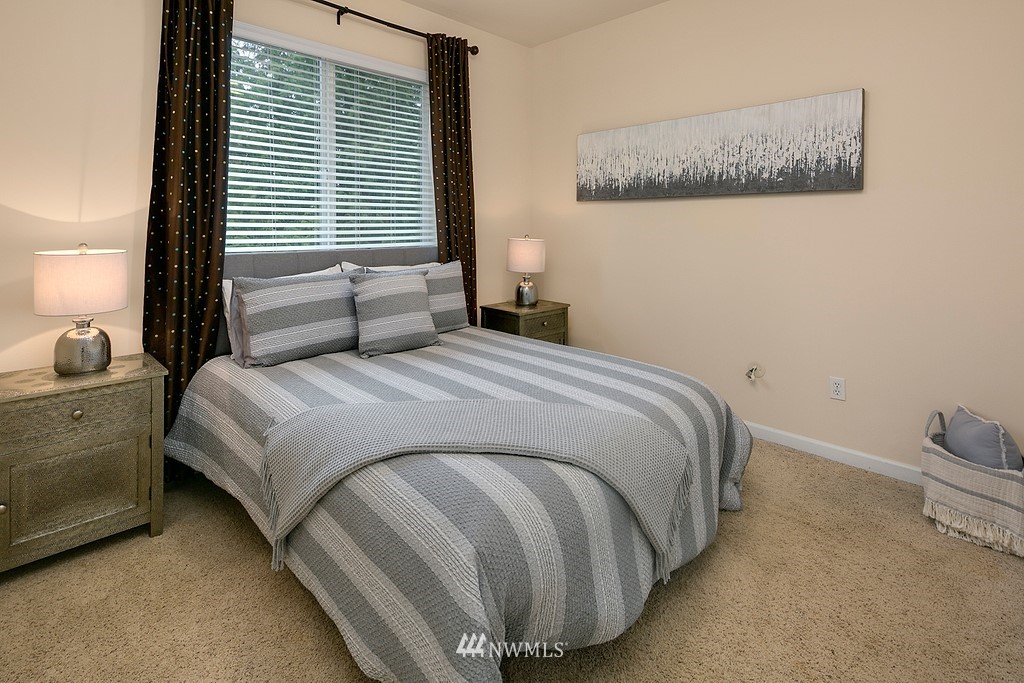 22214 151st Place Southeast Monroe, WA 98272 - Photo 19 of 28 a bedroom with a bed and a window