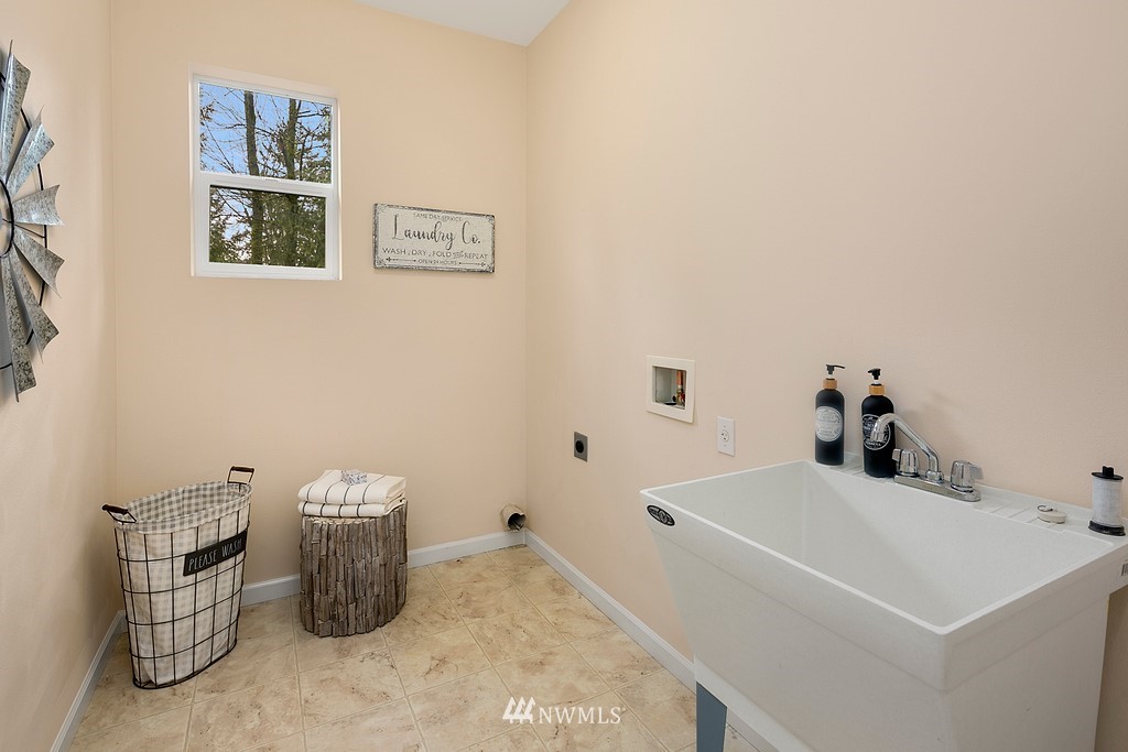 22214 151st Place Southeast Monroe, WA 98272 - Photo 20 of 28 a bathroom with a sink and a window