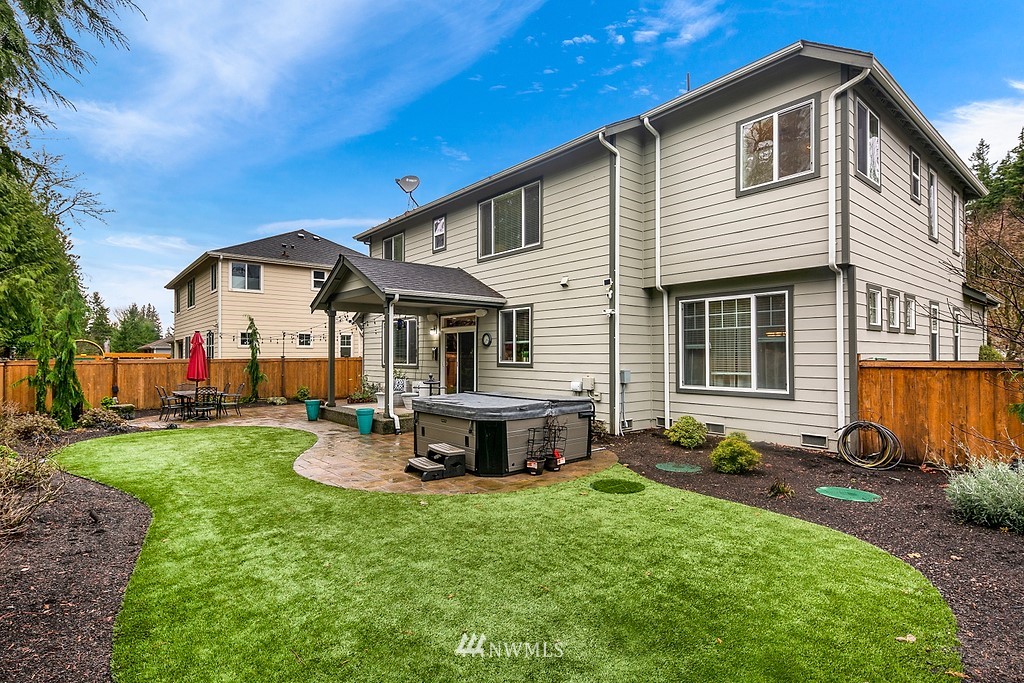 22214 151st Place Southeast Monroe, WA 98272 - Photo 26 of 28 a front view of house with a garden and patio