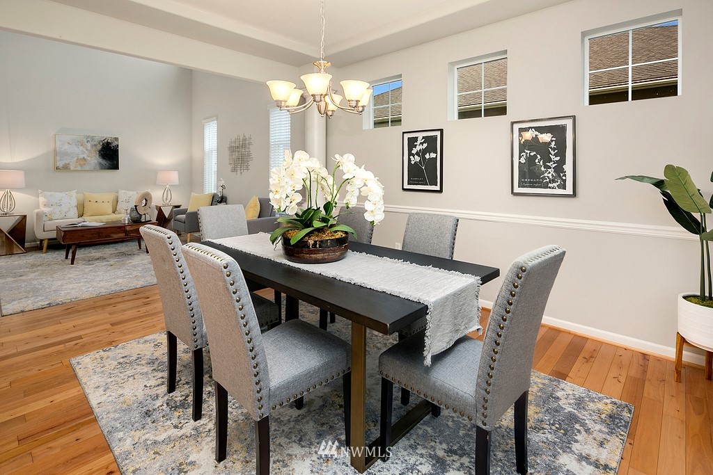 22214 151st Place Southeast Monroe, WA 98272 - Photo 6 of 28 a view of a dining room with furniture and chandelier