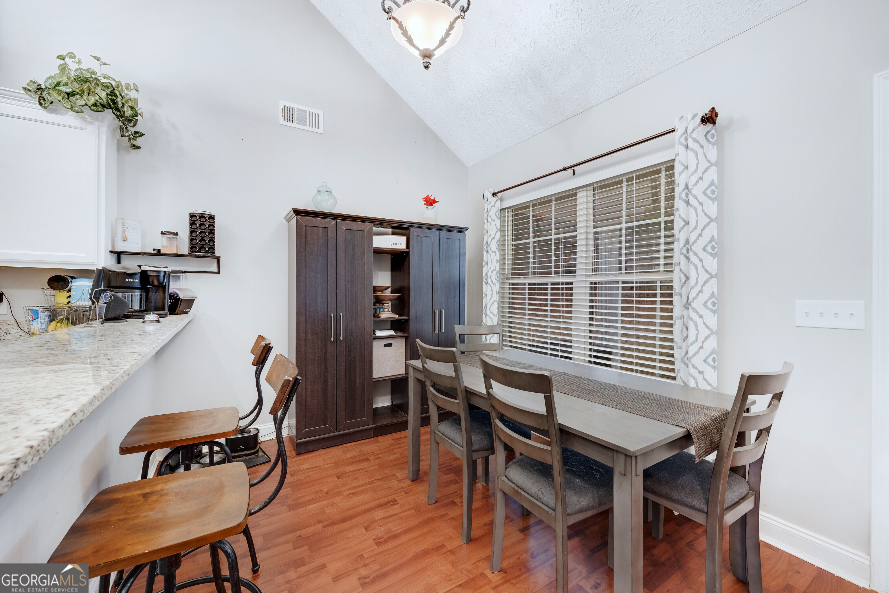 119 Cedar Ridge Drive LaGrange, GA 30241 - Photo 14 of 34 a view of a dining room with furniture window and wooden floor
