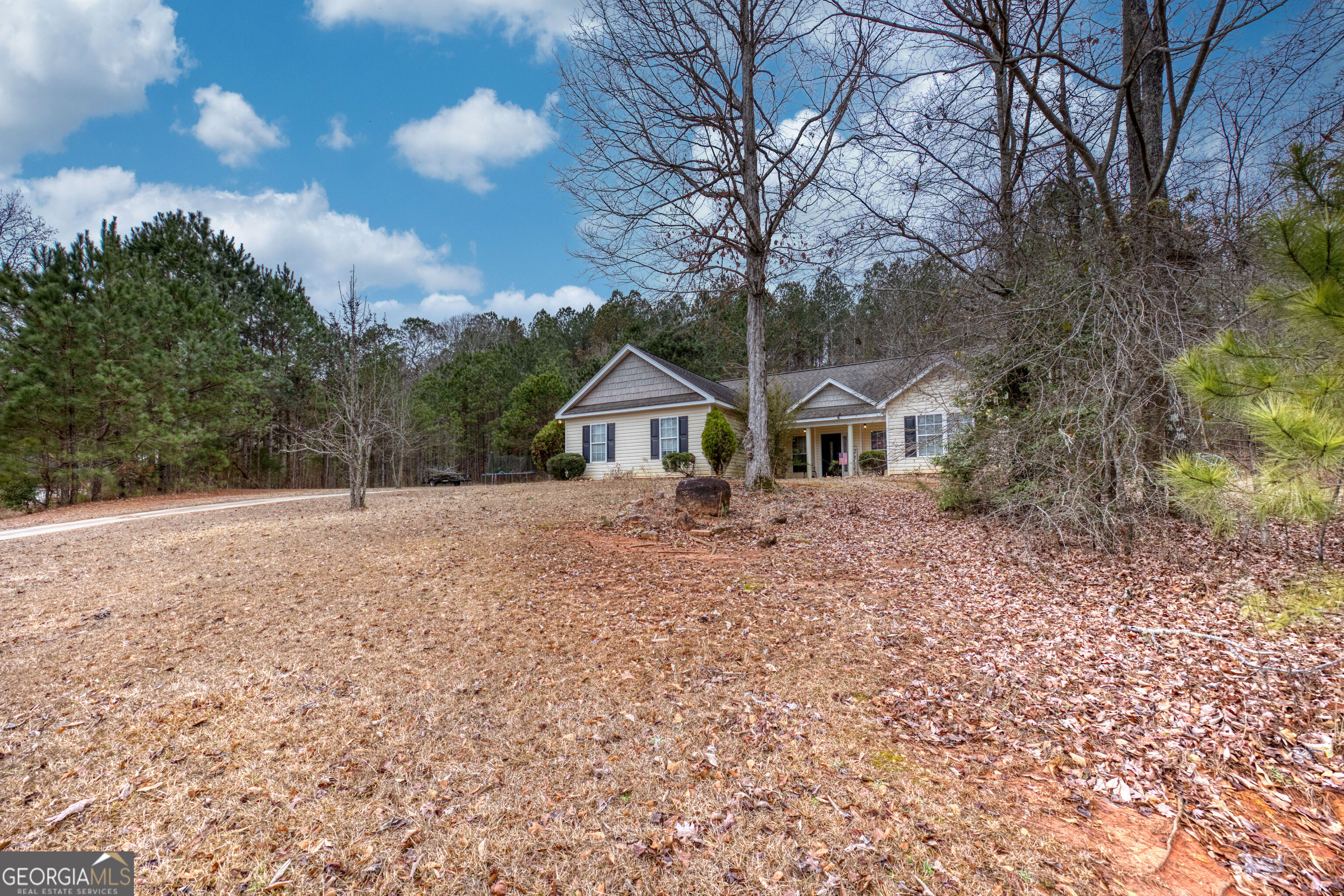 119 Cedar Ridge Drive LaGrange, GA 30241 - Photo 2 of 34 a front view of a house with a yard