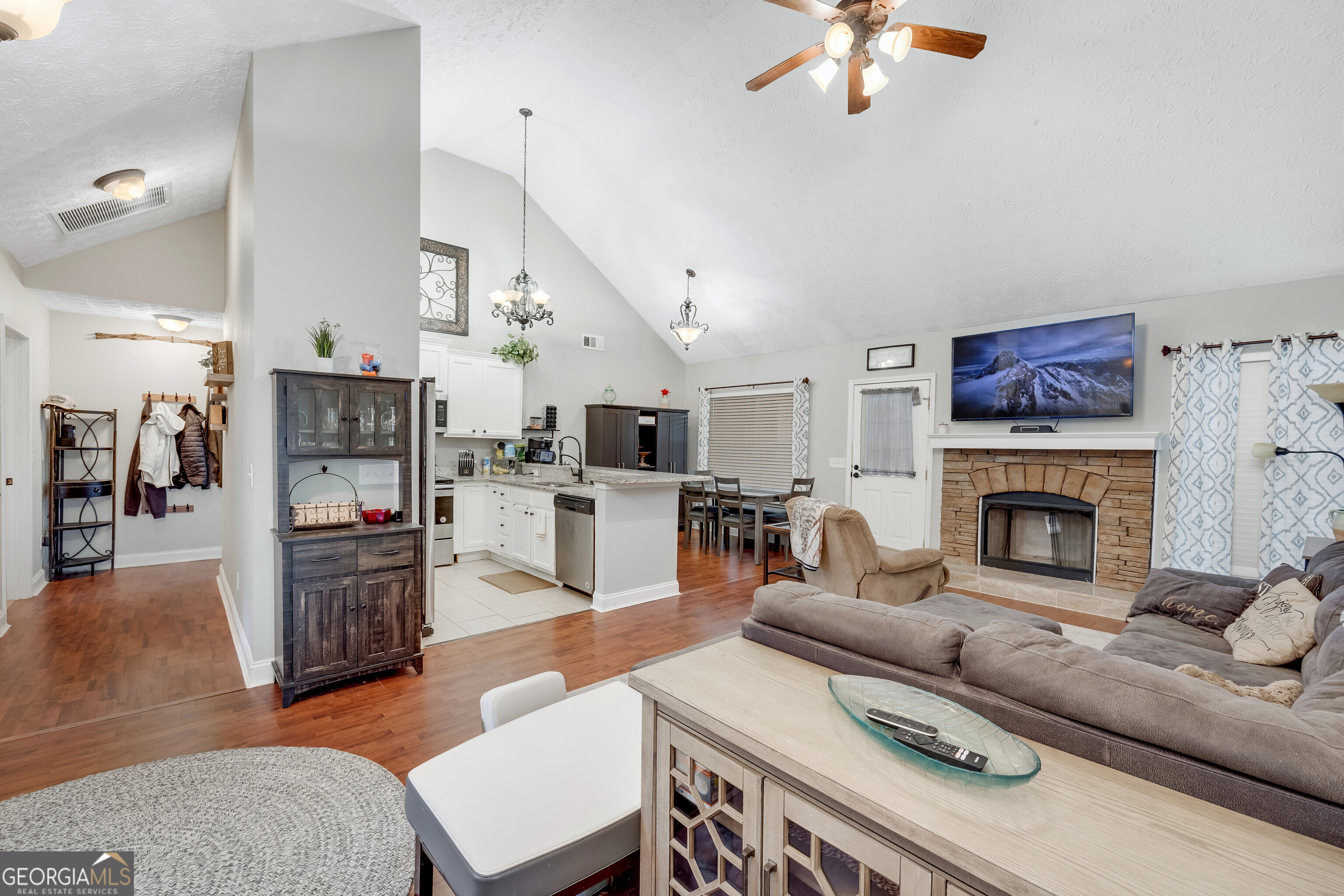119 Cedar Ridge Drive LaGrange, GA 30241 - Photo 6 of 34 a living room with furniture and a fireplace