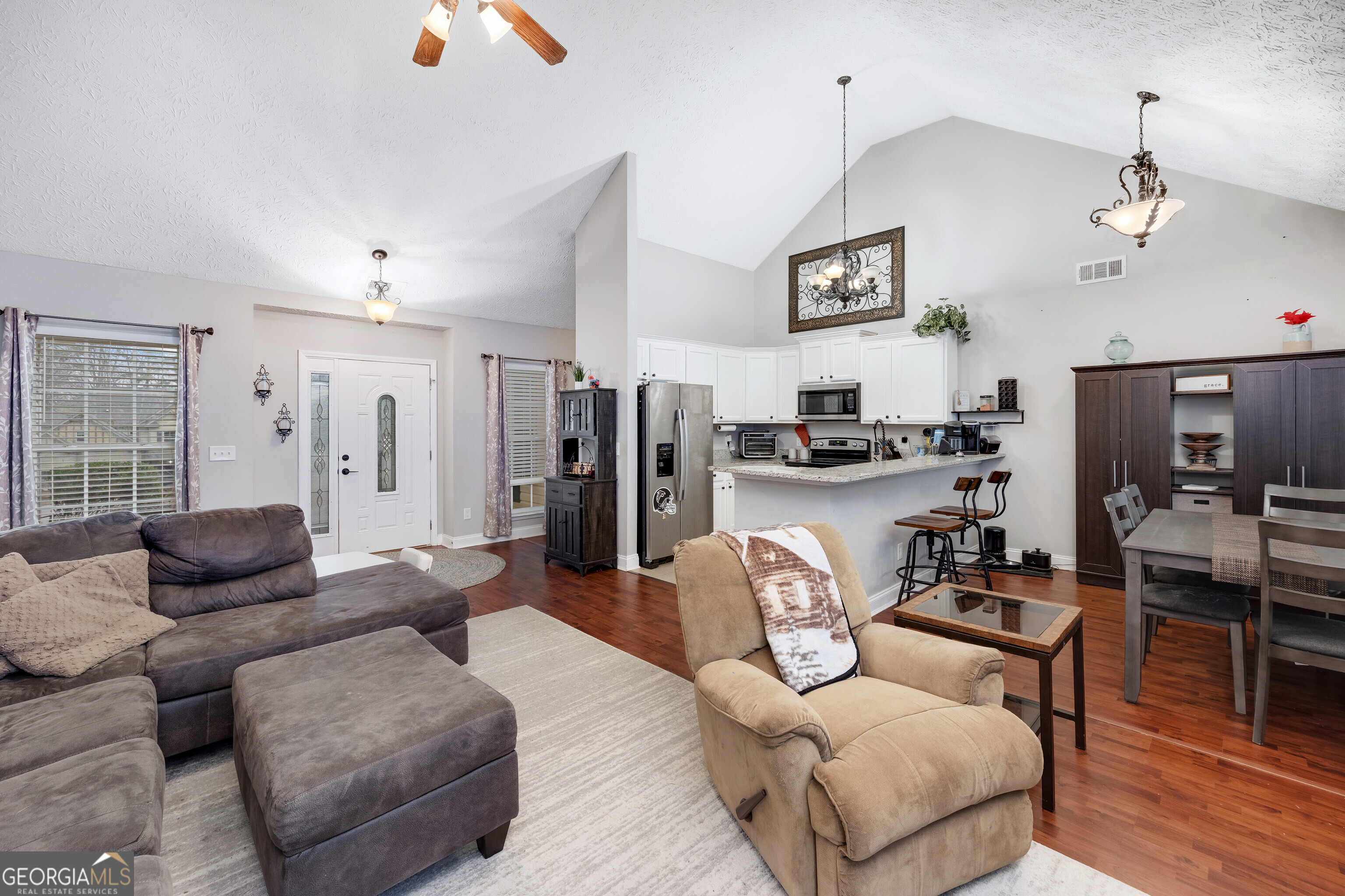 119 Cedar Ridge Drive LaGrange, GA 30241 - Photo 7 of 34 a living room with furniture kitchen view and a window