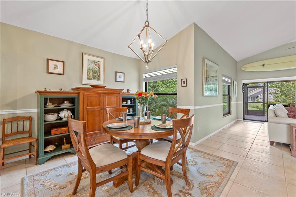 5120 Alpha Court Naples, FL 34105 - Photo 7 of 18 a dining room with furniture and window