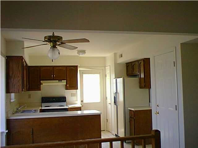 805 Harris Road Charlottesville, VA 22902 - Photo 3 of 9 a kitchen with a refrigerator and a sink