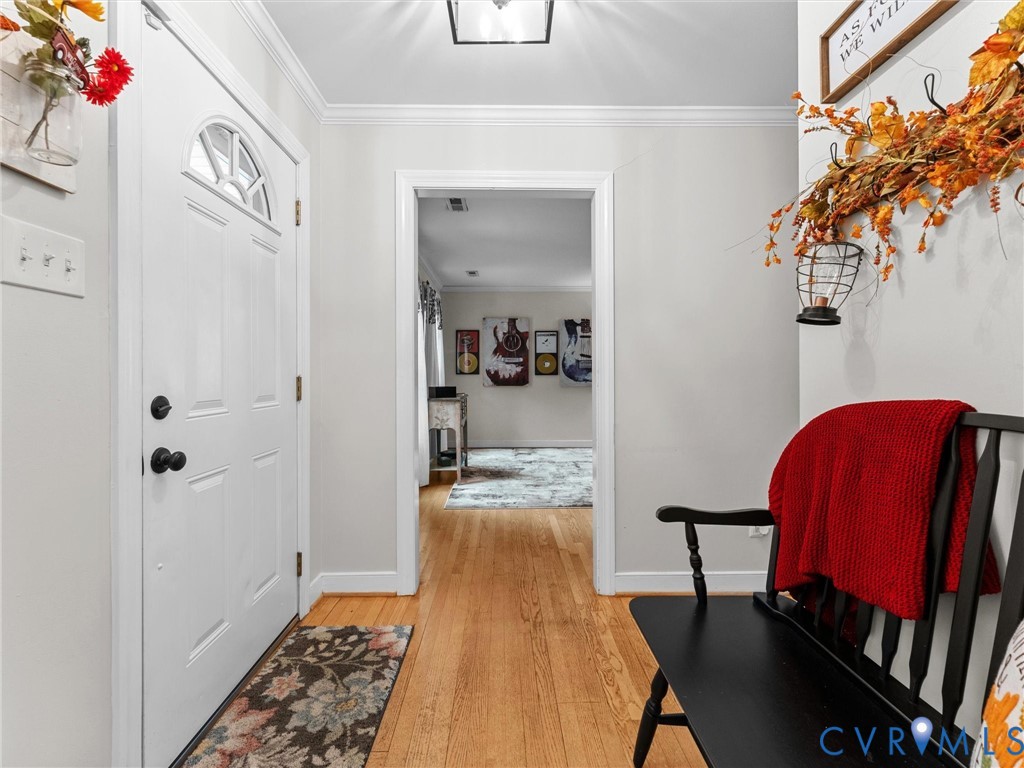 419 Walton Park Road Midlothian, VA 23114 - Photo 15 of 47 a view of a hallway to a livingroom with furniture