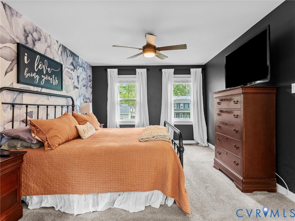 419 Walton Park Road Midlothian, VA 23114 - Photo 17 of 47 a bedroom with a bed and flat screen tv