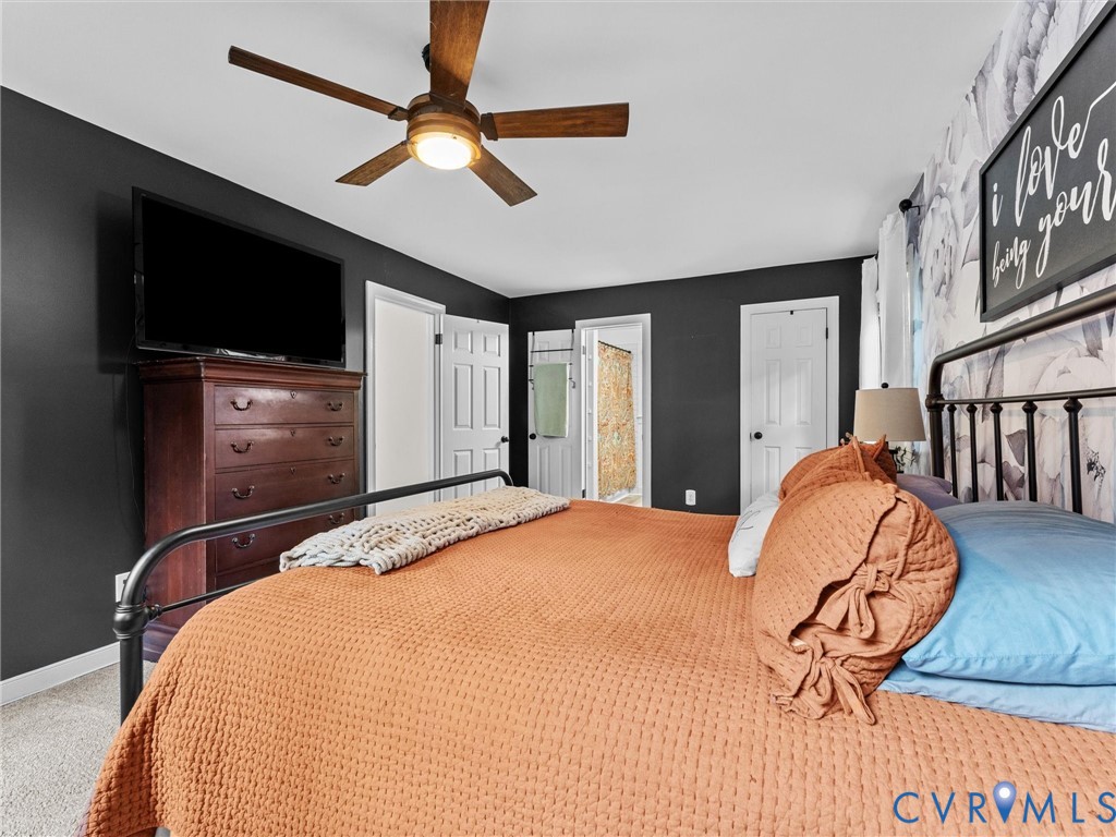 419 Walton Park Road Midlothian, VA 23114 - Photo 18 of 47 a bedroom with a bed and a flat screen tv