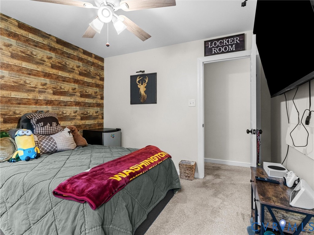 419 Walton Park Road Midlothian, VA 23114 - Photo 28 of 47 a bedroom with a bed and ceiling fan
