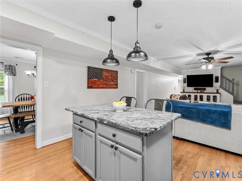 419 Walton Park Road Midlothian, VA 23114 - Photo 3 of 47 a kitchen with a stove a refrigerator and a wooden floor