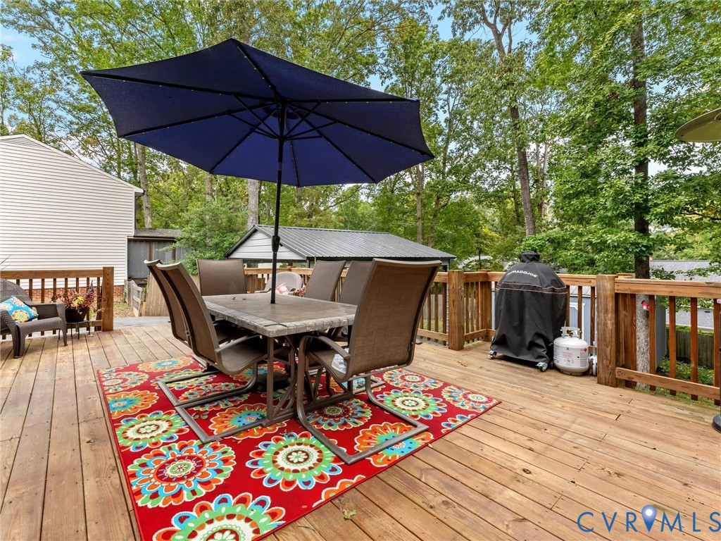 419 Walton Park Road Midlothian, VA 23114 - Photo 37 of 47 a view of balcony with outdoor seating and wooden floor