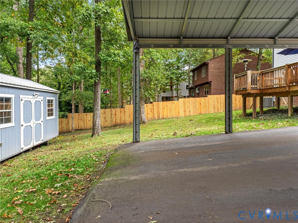 419 Walton Park Road Midlothian, VA 23114 - Photo 39 of 47 a view of a house with backyard and porch