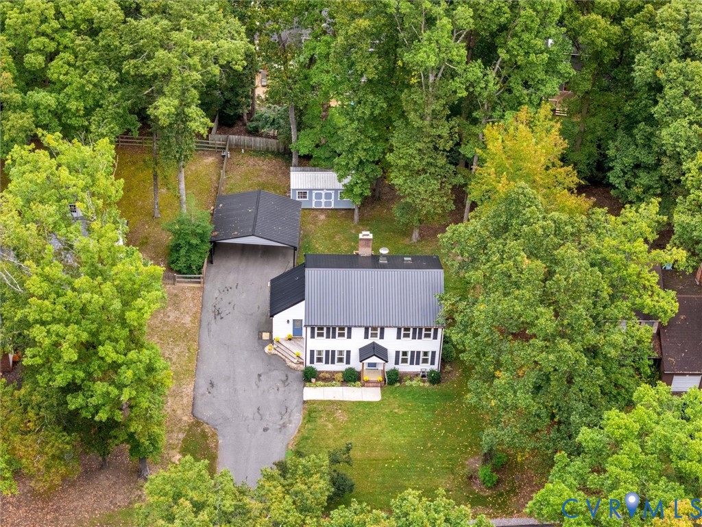419 Walton Park Road Midlothian, VA 23114 - Photo 44 of 47 an aerial view of a house with swimming pool and garden