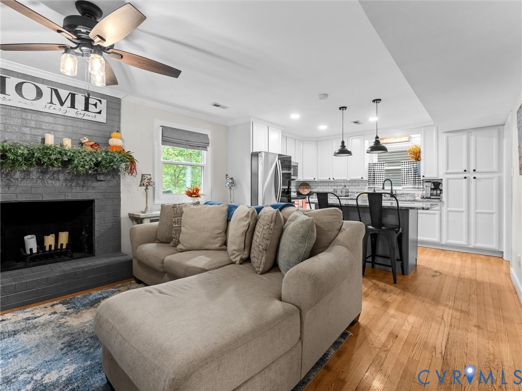419 Walton Park Road Midlothian, VA 23114 - Photo 8 of 47 a living room with furniture and a fireplace