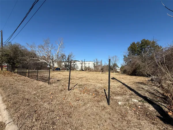 a view of a road with a yard