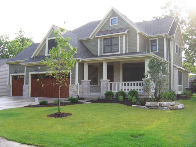 4525 Sterling Road Downers Grove, IL 60515 - Photo 1 of 9 a front view of a house with a garden