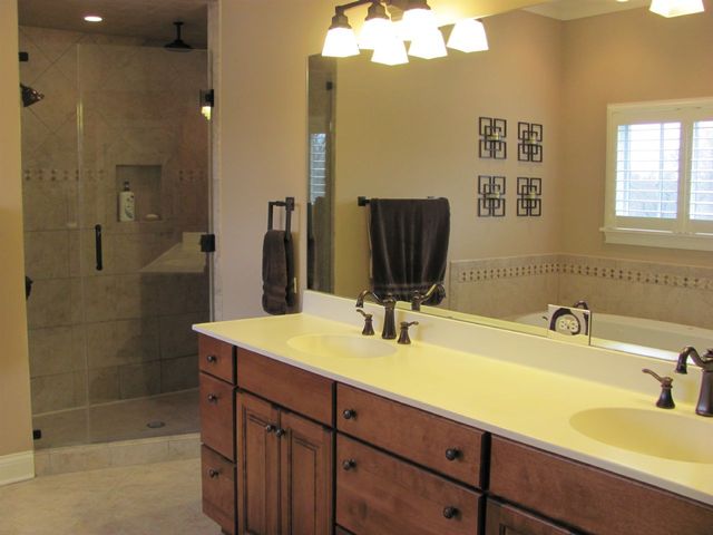4525 Sterling Road Downers Grove, IL 60515 - Photo 8 of 9 a bathroom with a sink double vanity and a mirror