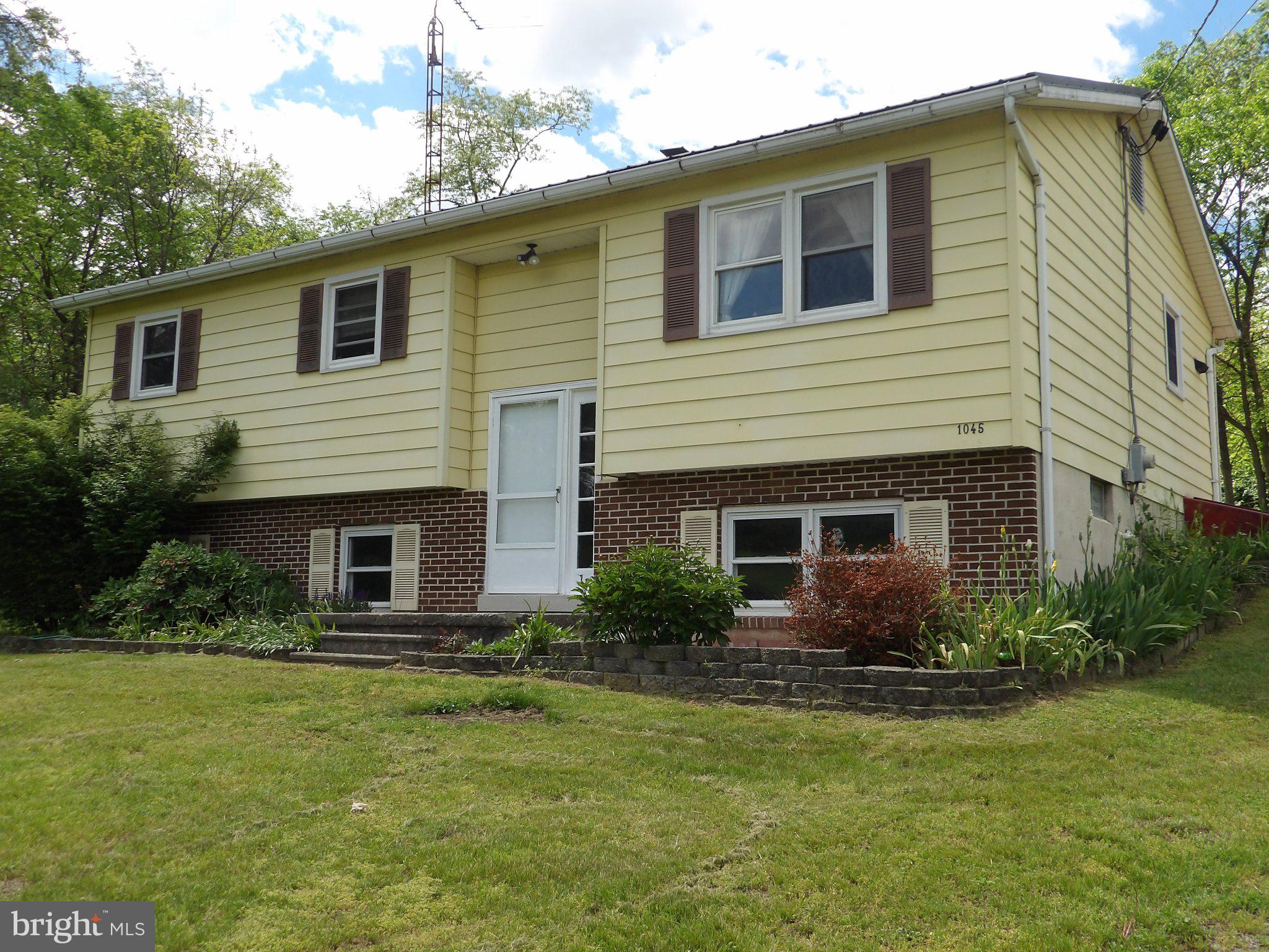 1045 Lockport Road Lewistown, PA 17044 - Photo 45 of 51 Charming split-level home with greenery.