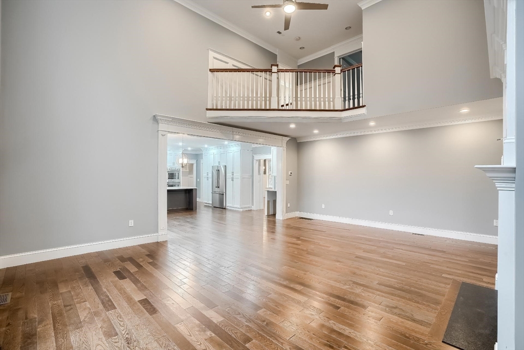 19 Stoney Brook Road Hopkinton, MA 01748 - Photo 11 of 41 a view of an empty room with window and wooden floor