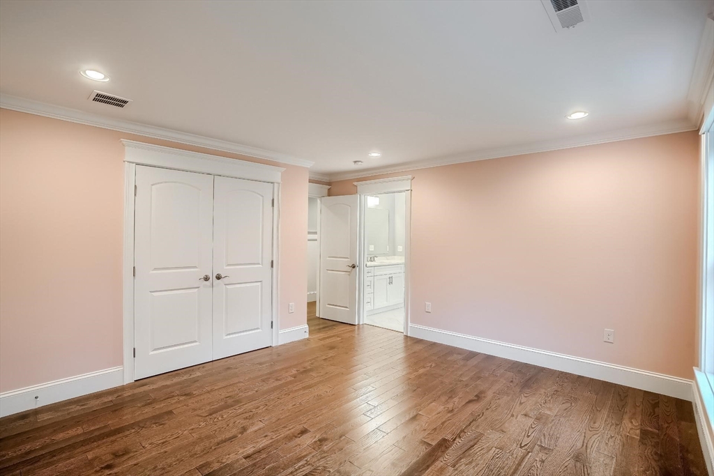 19 Stoney Brook Road Hopkinton, MA 01748 - Photo 28 of 41 a view of an empty room with wooden floor