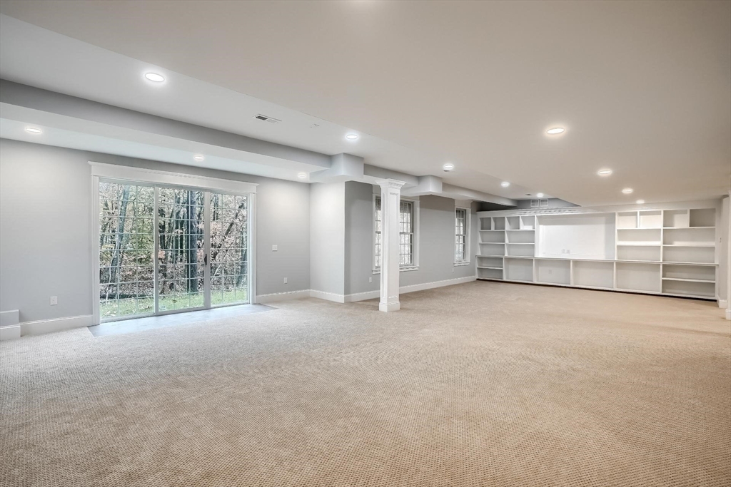 19 Stoney Brook Road Hopkinton, MA 01748 - Photo 37 of 41 a view of an empty room with a window