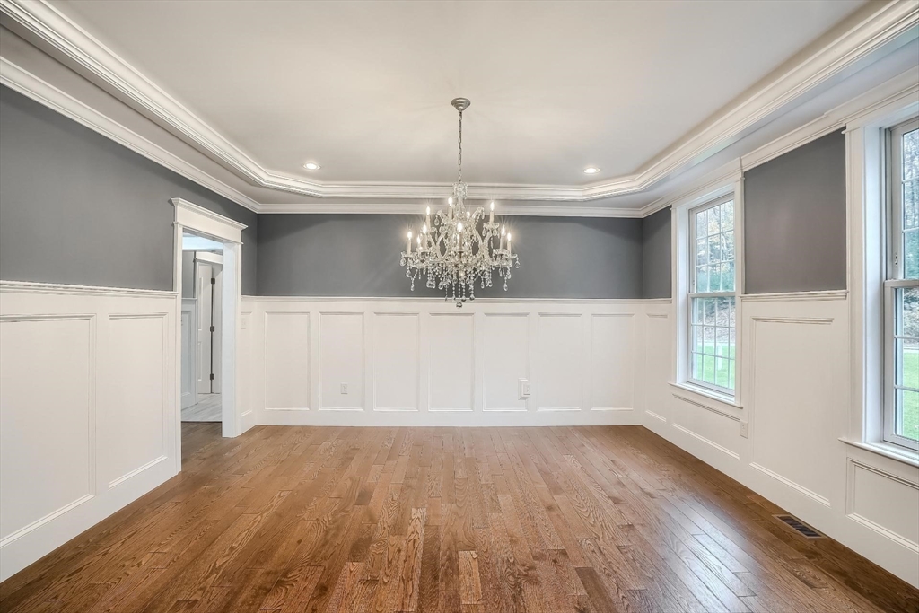 19 Stoney Brook Road Hopkinton, MA 01748 - Photo 5 of 41 a view of a kitchen with wooden floor and cabinets