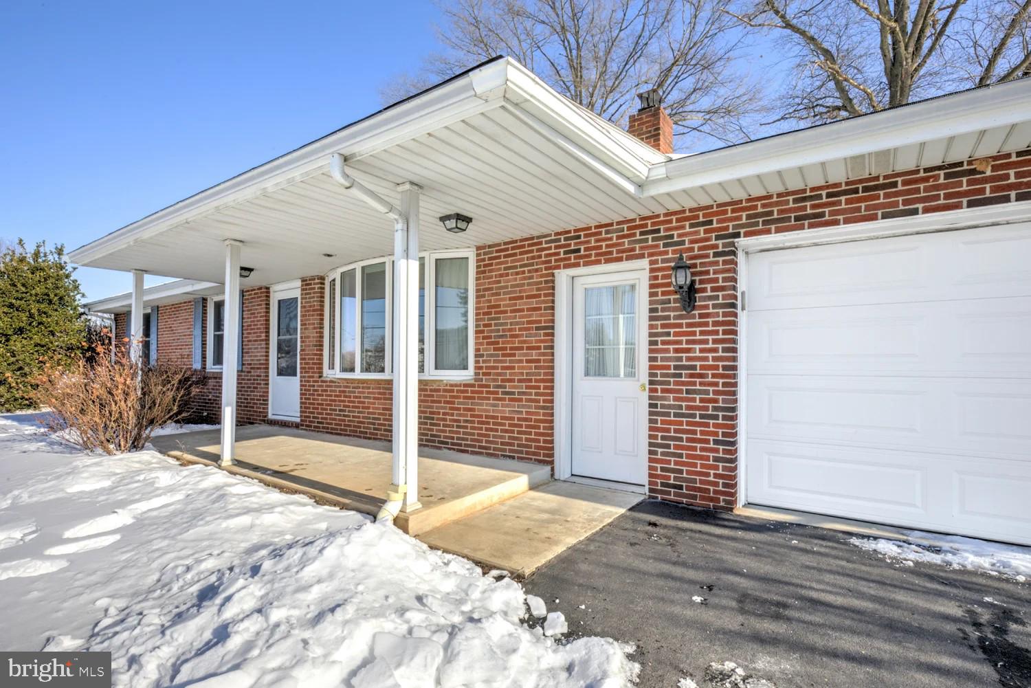 720 South Cocalico Road Denver, PA 17517 - Photo 3 of 14 a view of house with wooden floor and wooden fence