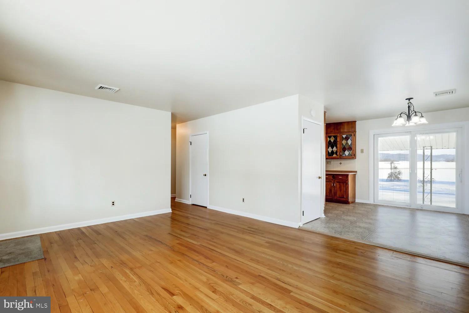 720 South Cocalico Road Denver, PA 17517 - Photo 5 of 14 wooden floor in an empty room