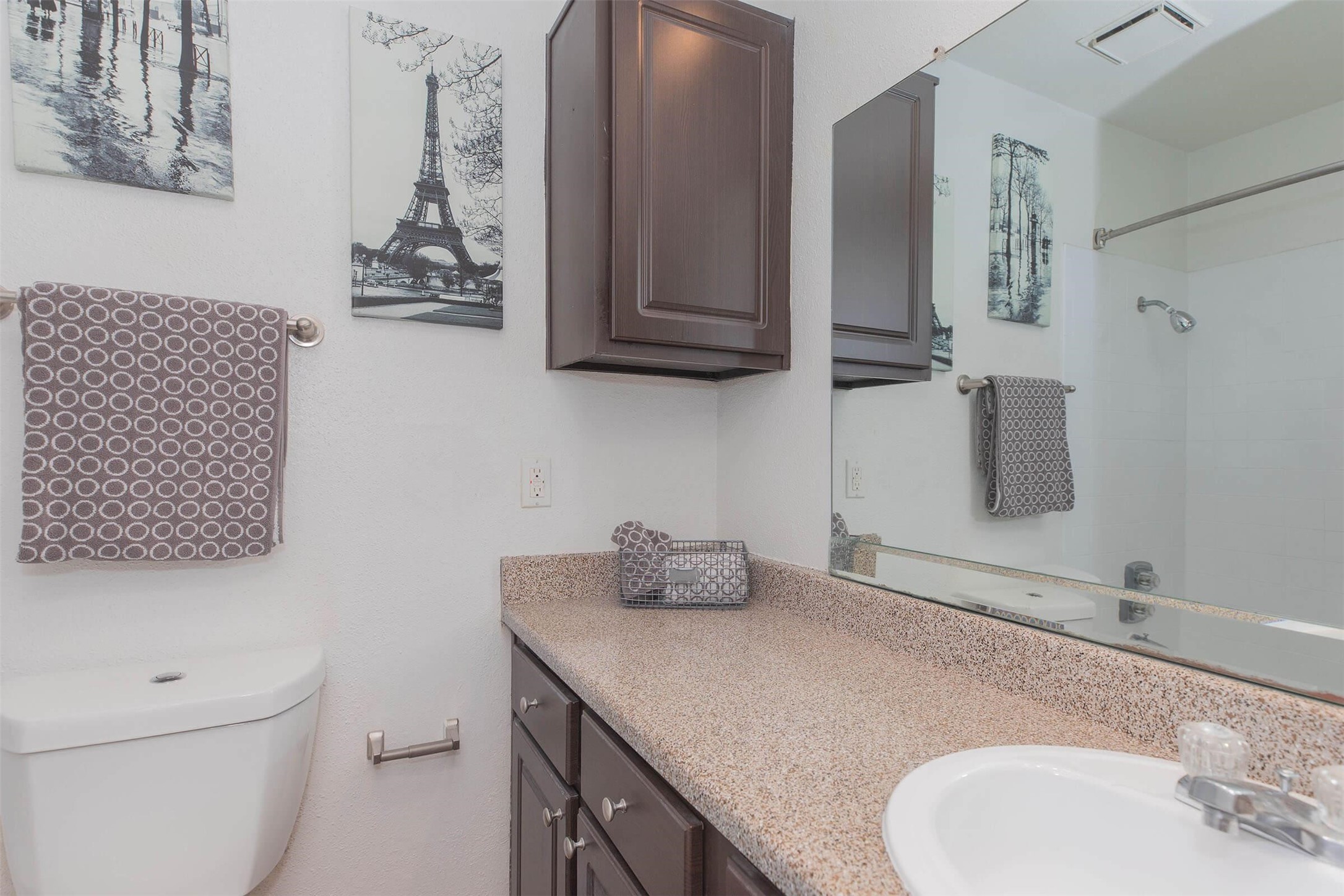 21717 Inverness Forest Boulevard, Unit 410 Houston, TX 77073 - Photo 6 of 33 a bathroom with a sink toilet and mirror