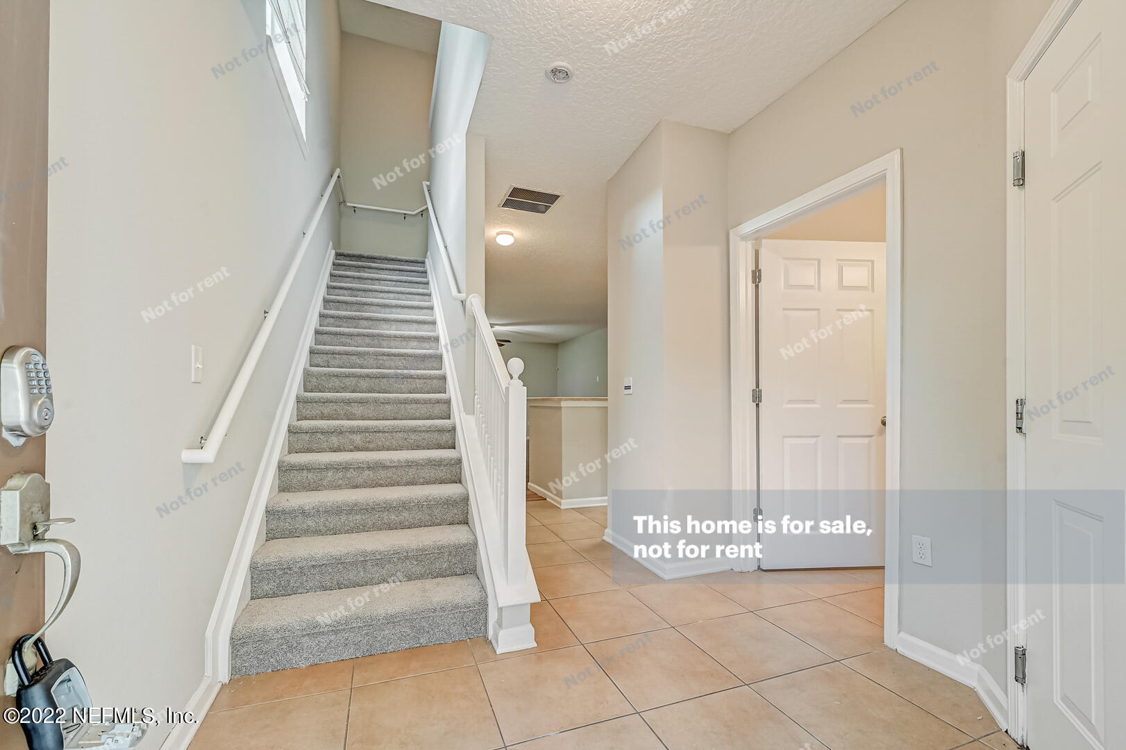 5663 Greenland Road, Unit 1801 Jacksonville, FL 32258 - Photo 12 of 26 a view of an entryway with staircase