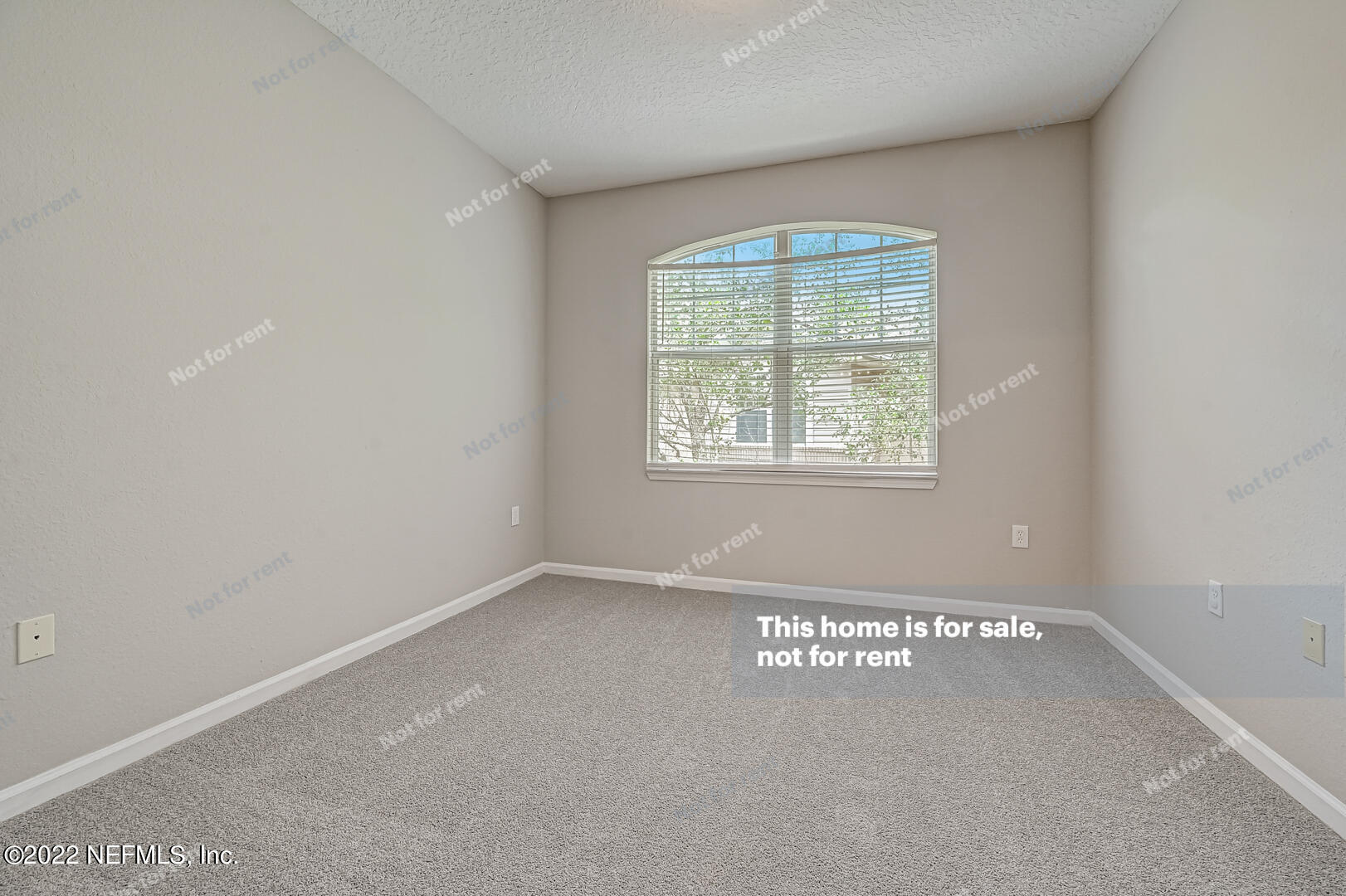 5663 Greenland Road, Unit 1801 Jacksonville, FL 32258 - Photo 15 of 26 an empty room with a window