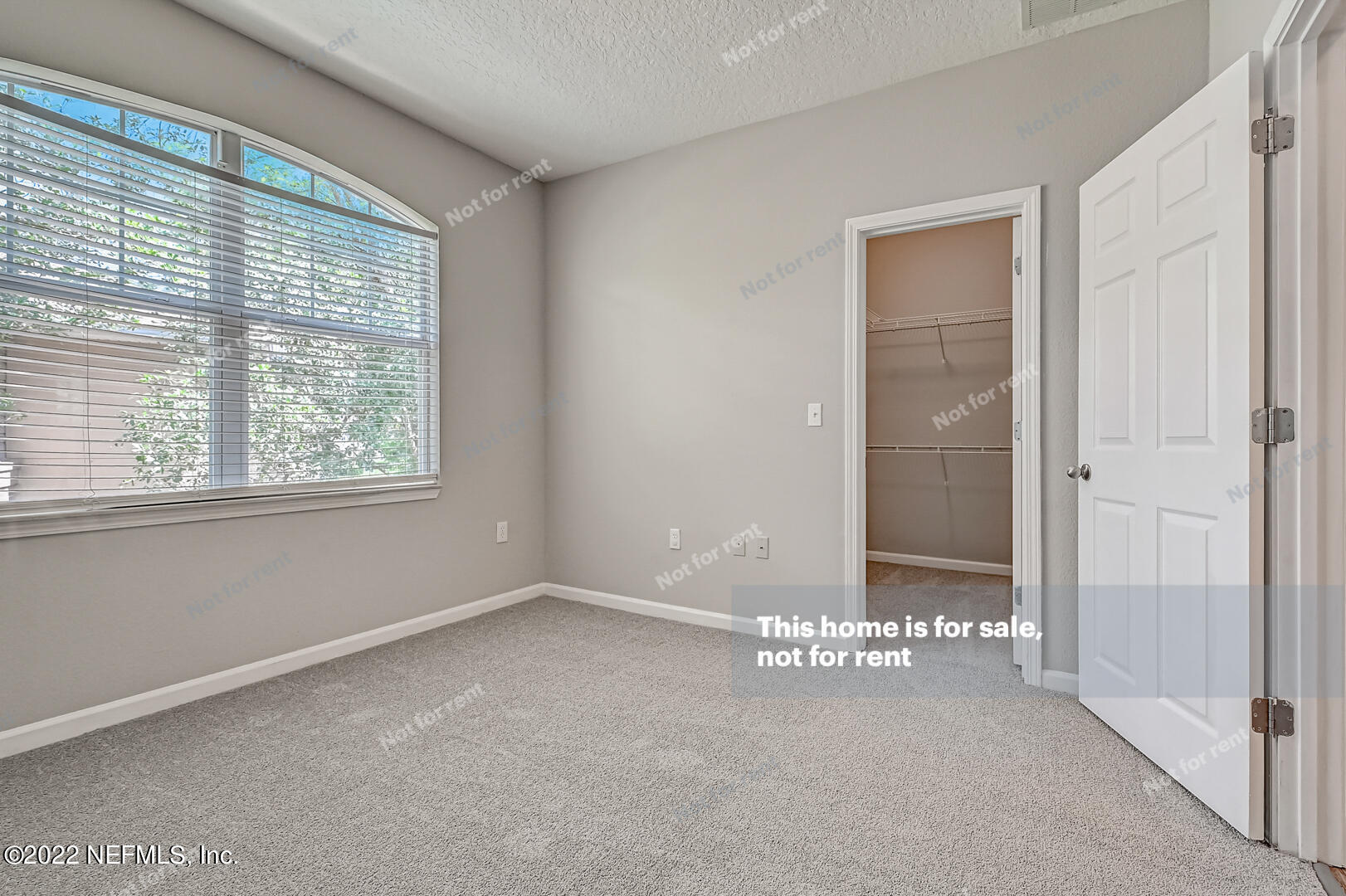 5663 Greenland Road, Unit 1801 Jacksonville, FL 32258 - Photo 16 of 26 a view of an empty room with a window