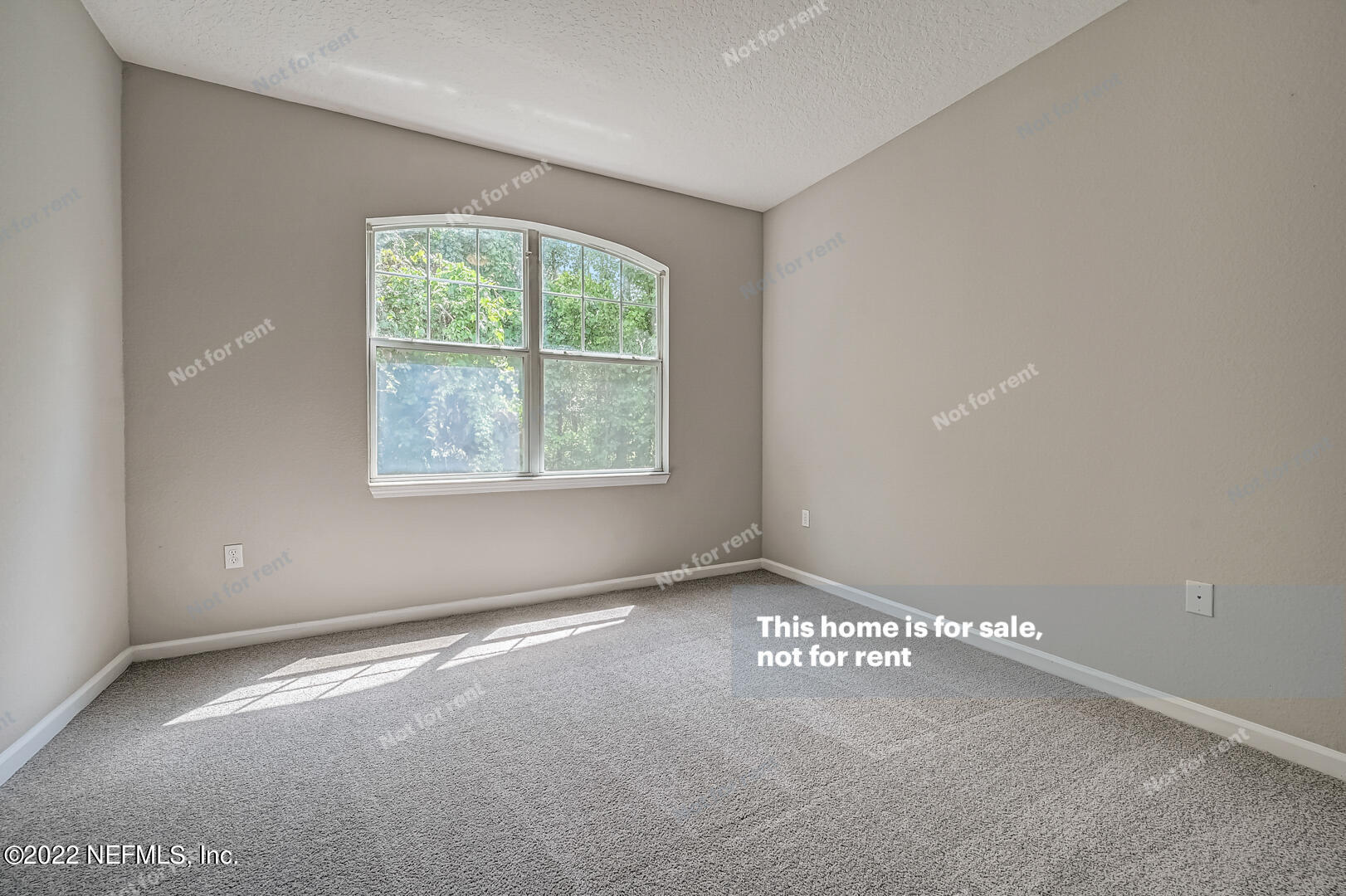 5663 Greenland Road, Unit 1801 Jacksonville, FL 32258 - Photo 7 of 26 an empty room with a window