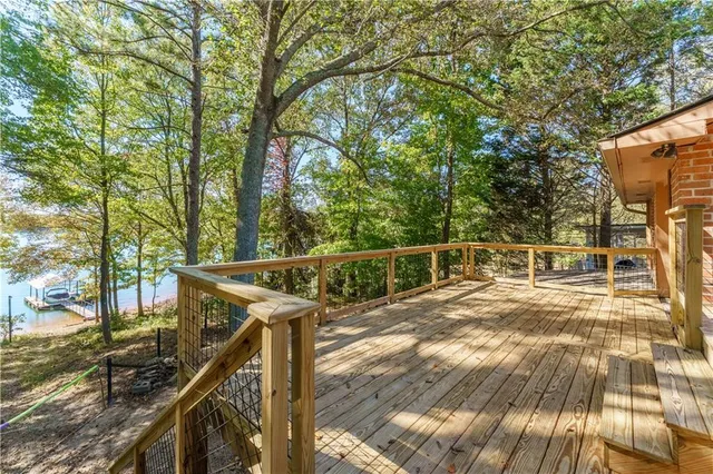 a view of a balcony with chairs