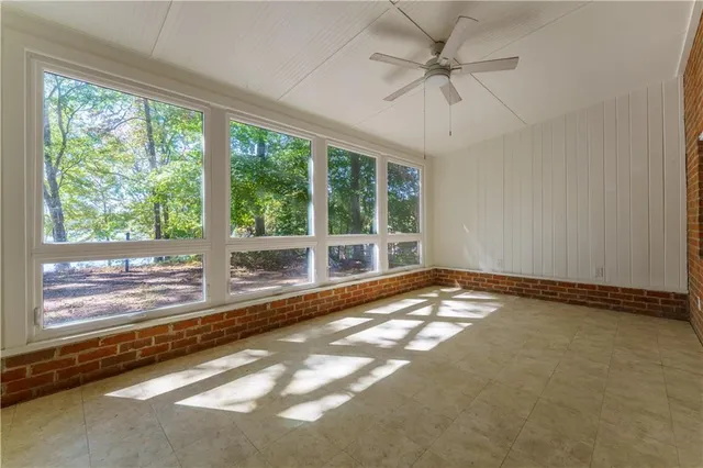 a view of an empty room and window