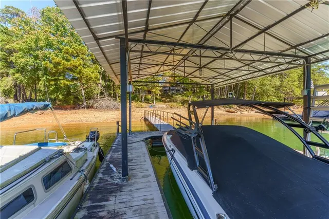 a picture of a room with wall and refrigerator