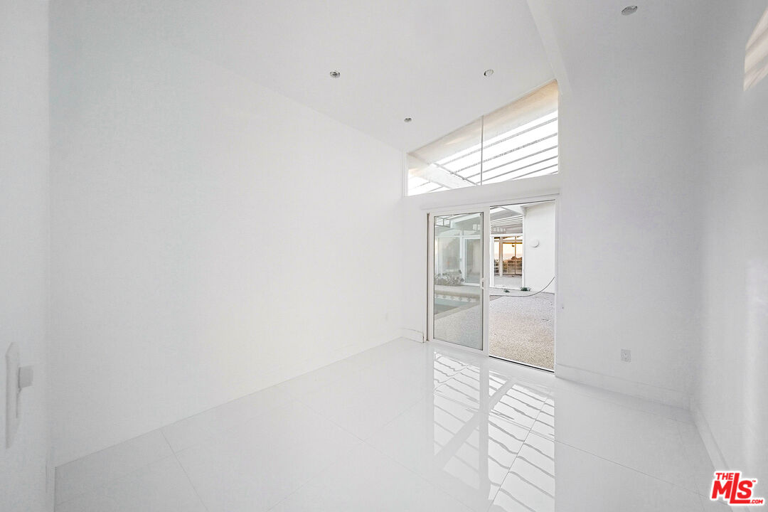 6246 Trancas Canyon Road Malibu, CA 90265 - Photo 15 of 23 a view of a hallway with wooden floor and closet