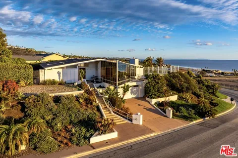 a view of a house with a patio