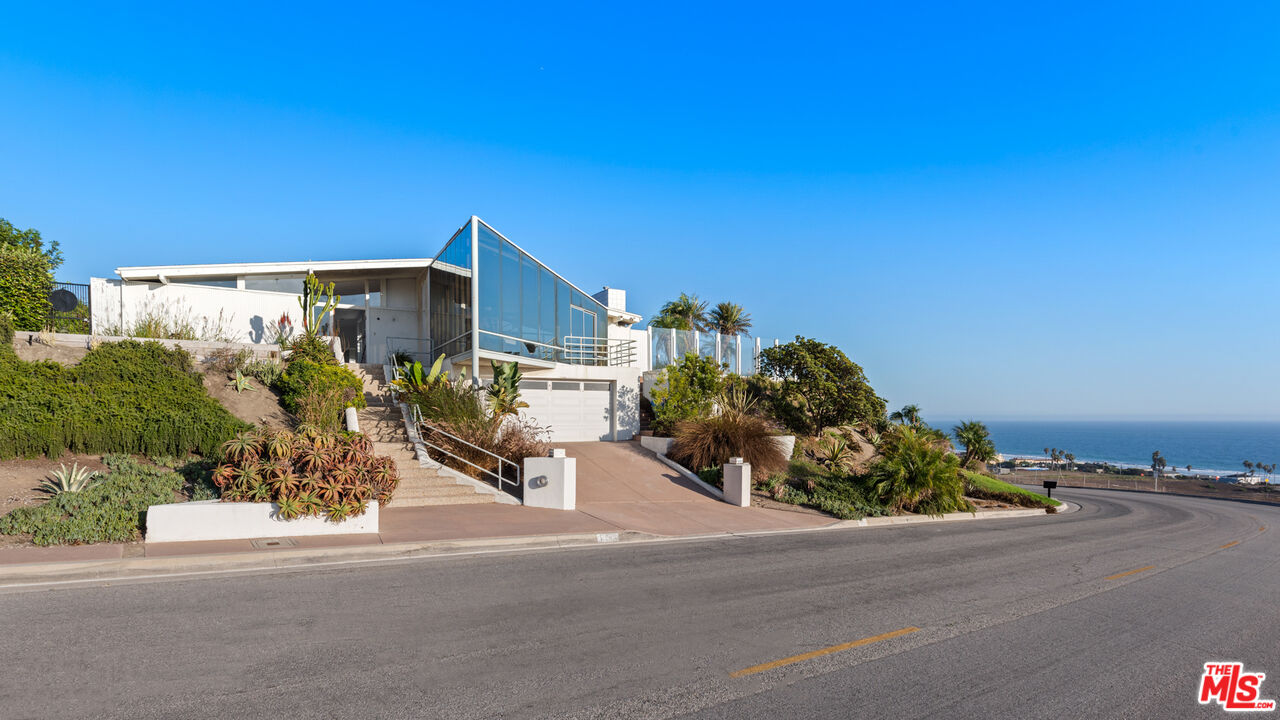 6246 Trancas Canyon Road Malibu, CA 90265 - Photo 2 of 23 a picture of a building with a street