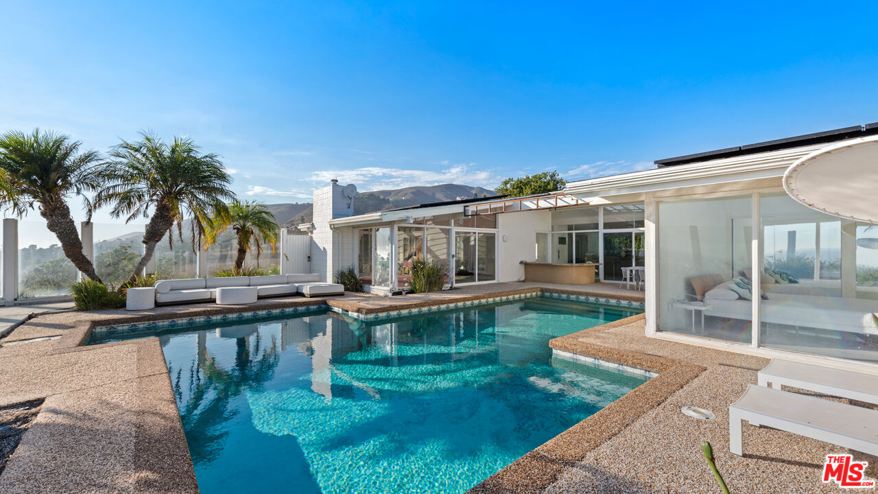 6246 Trancas Canyon Road Malibu, CA 90265 - Photo 3 of 23 a view of a house with pool porch and sitting area