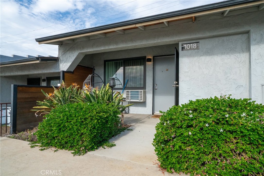 1010 Clearbrook Lane Vista, CA 92084 - Photo 15 of 23 a front view of a house with garden