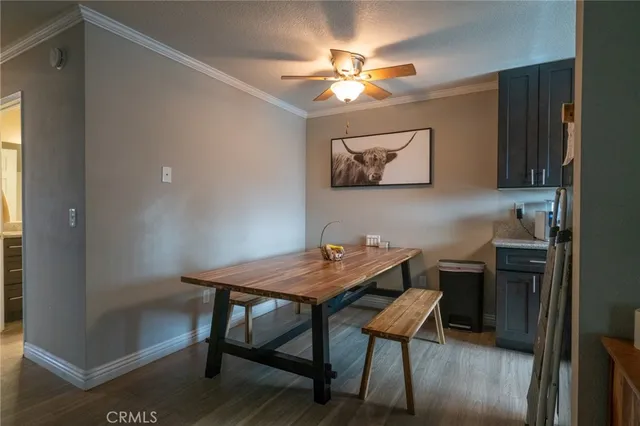 a kitchen with granite countertop a stove and a sink