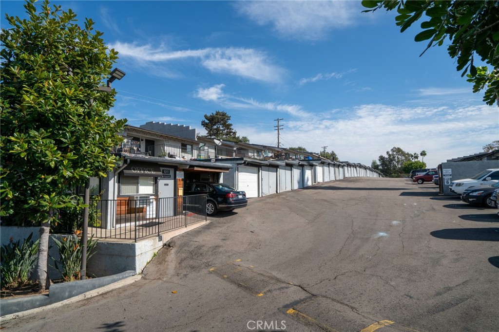 1010 Clearbrook Lane Vista, CA 92084 - Photo 4 of 23 a view of a street with a car parked in front of it
