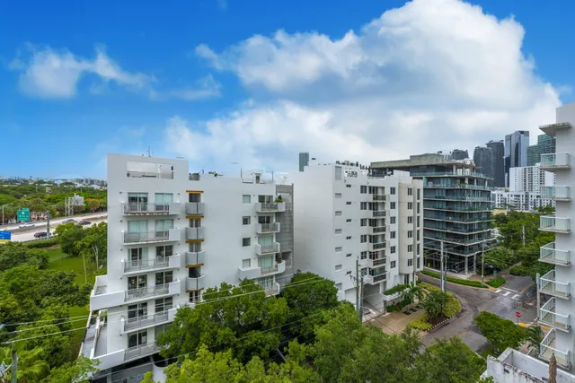 a view of a city with tall buildings