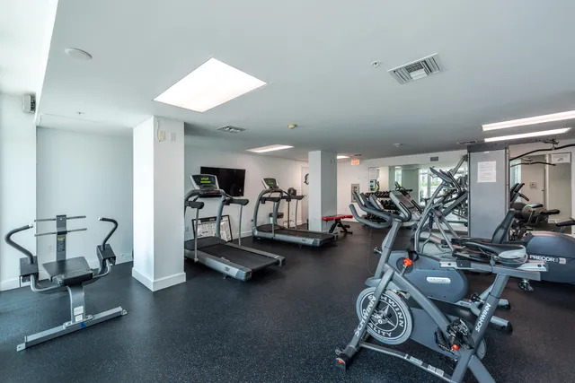 a view of a building with a tree