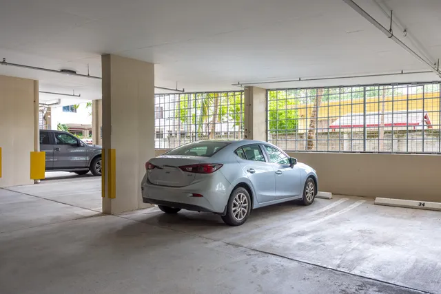 a and car parked in front of a house