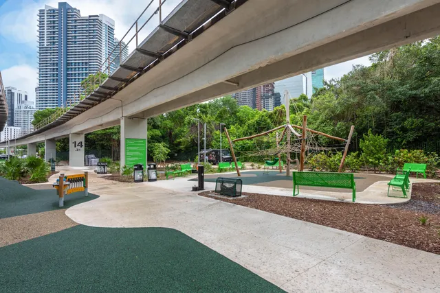 a view of a chair and table in the garden
