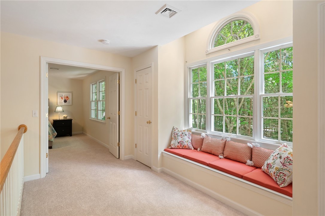 1875 Middle Road East Greenwich, RI 02818 - Photo 23 of 49 Upstairs hallway with window seat. Seat opens for storage.