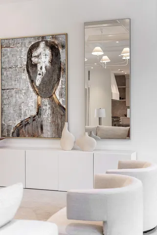 a living room with furniture a window and a fireplace